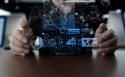 Businessman hand using mobile phone with digital layer effect as business strategy concept